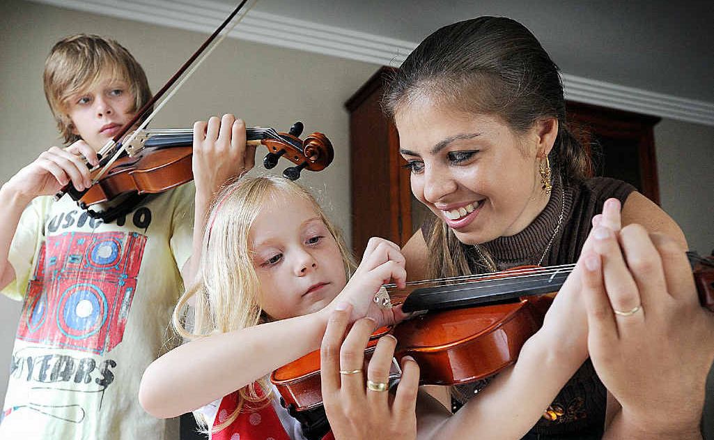 Claudia Zorbas-Rajnaine with students Ferenc, 12, and Irene, 5, Gall. Claudia Zorbas-Rajnaine with students Ferenc, 12, and Irene, 5, Gall.